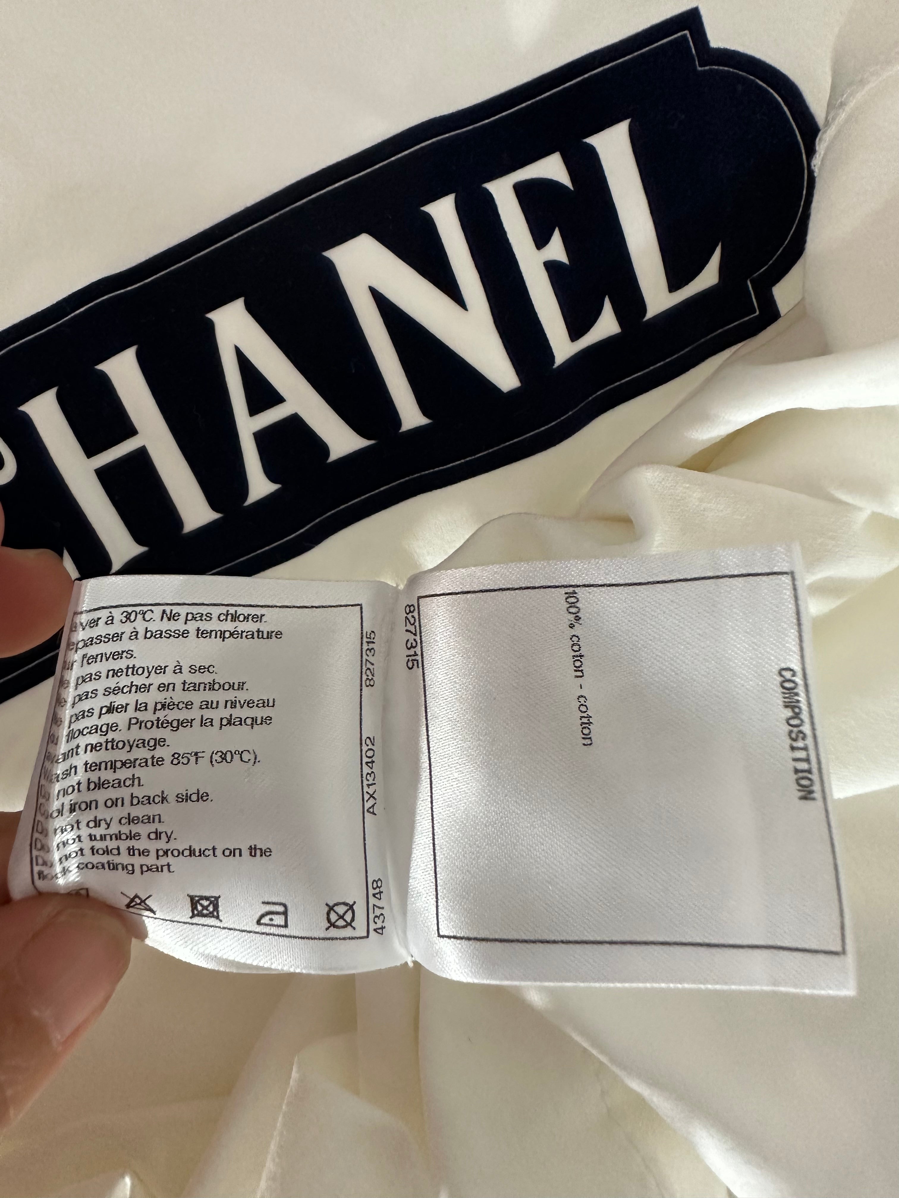 Chanel white top with "Gabrielle Chanel" lettering in navy blue - size 34
