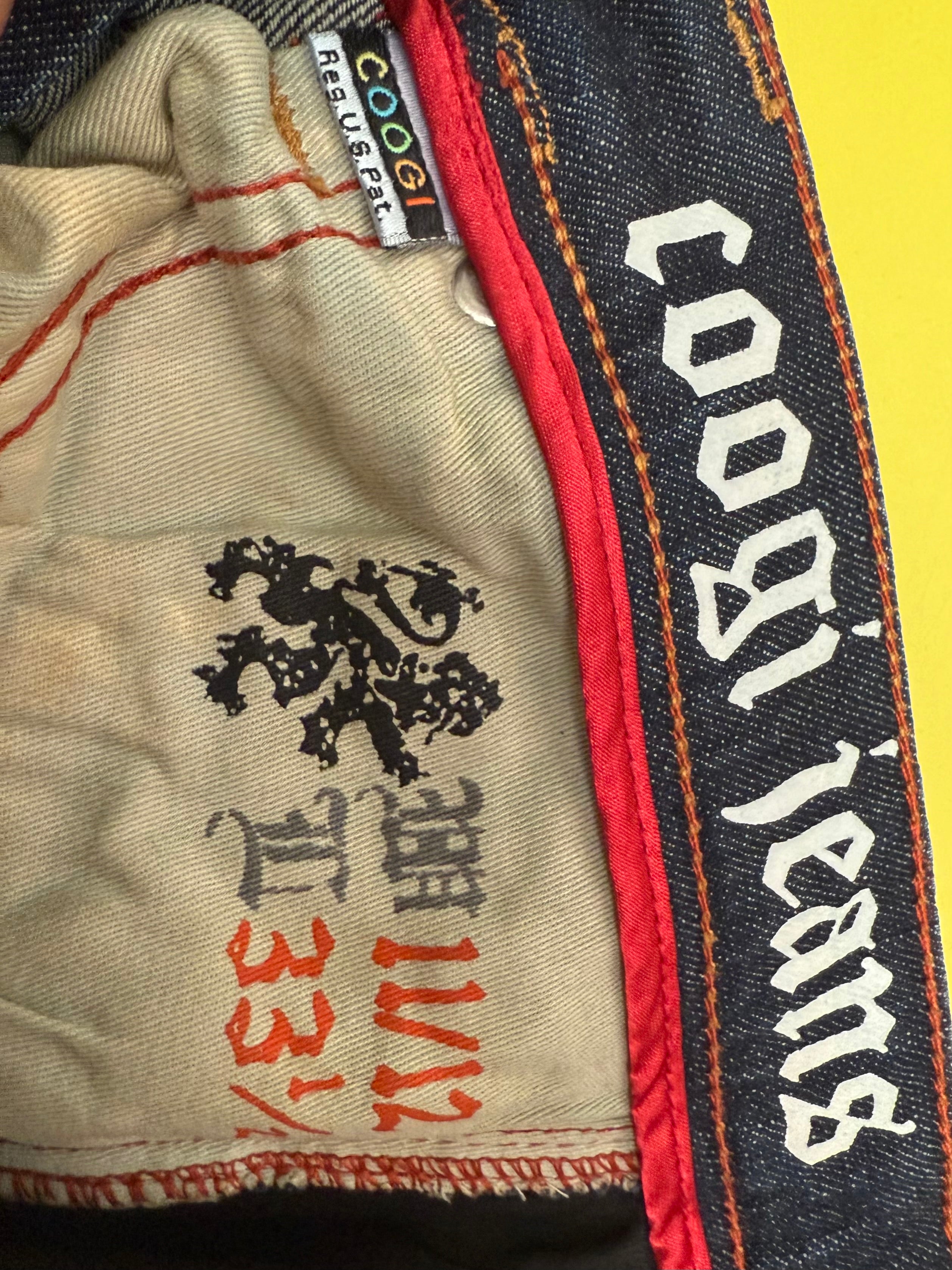 Coogi dark denim jeans with multicolor embroidery - size 33
