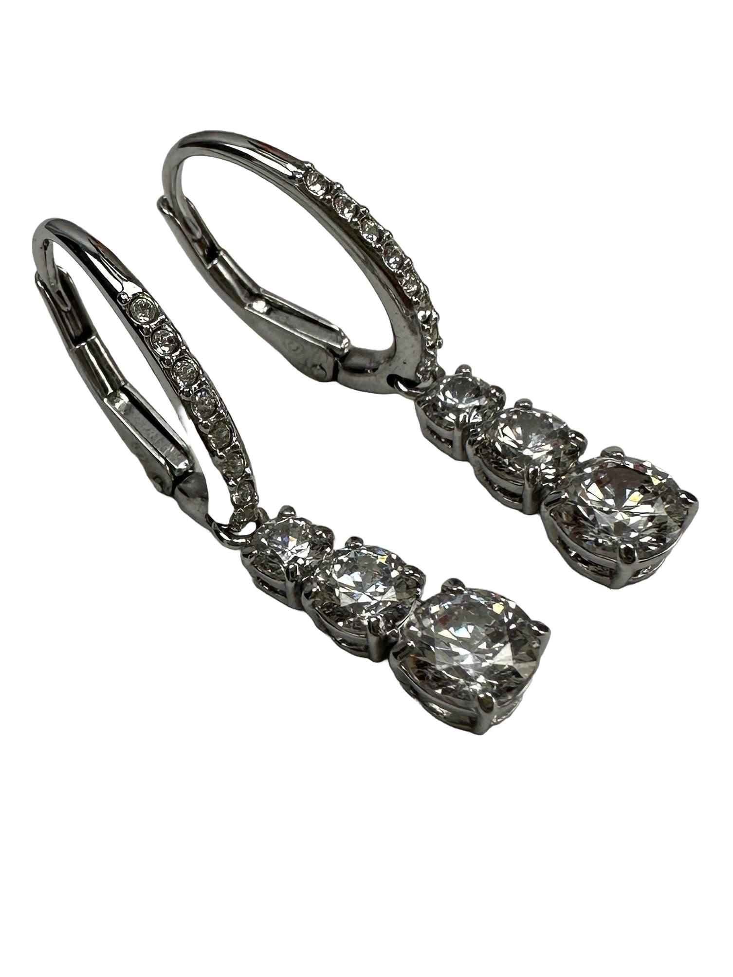 Swarovski attract trilogy round pierced earrings in rhodium-plated metal