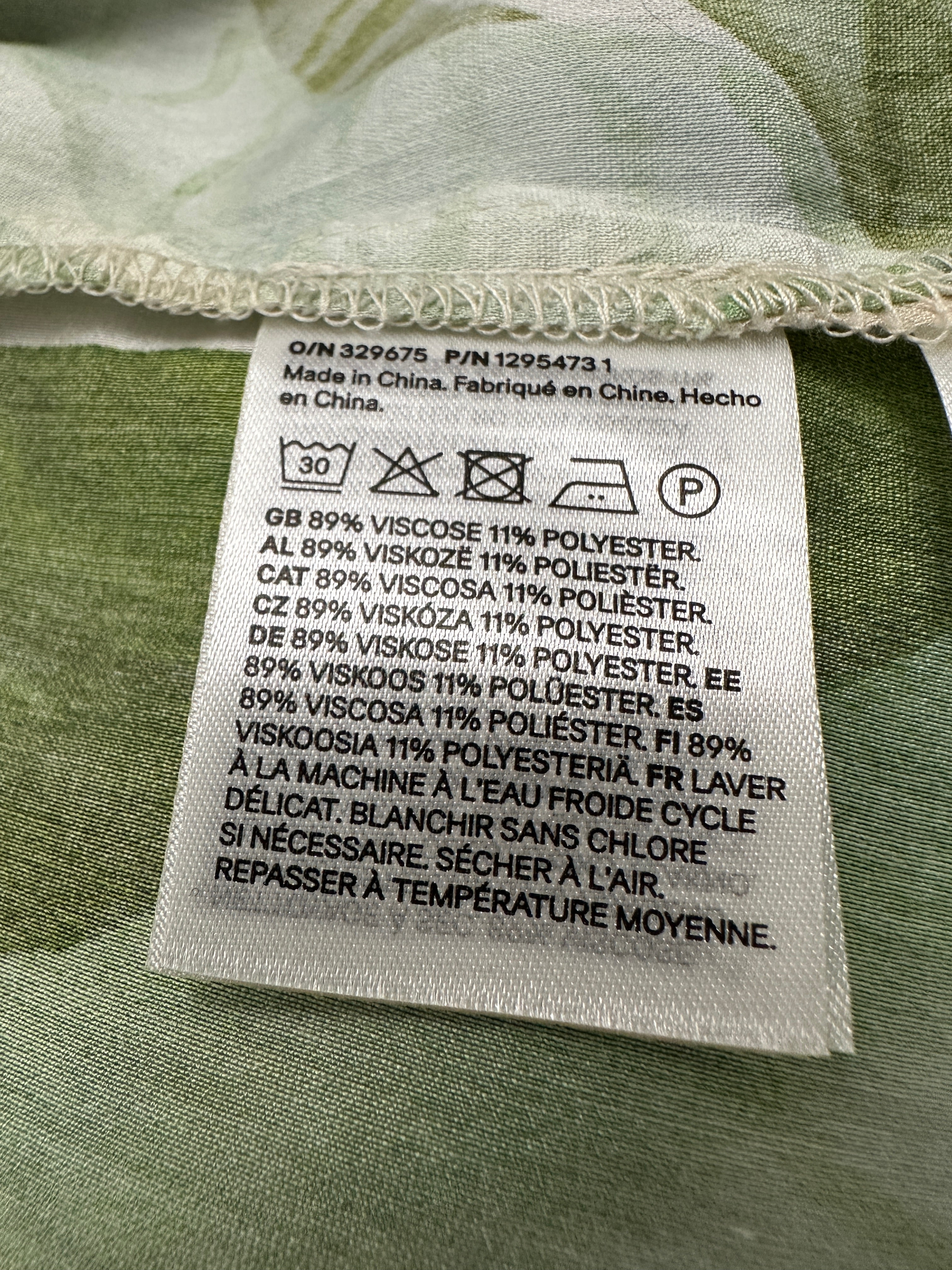 H&M Edition cream shirt with leaf pattern - size 38