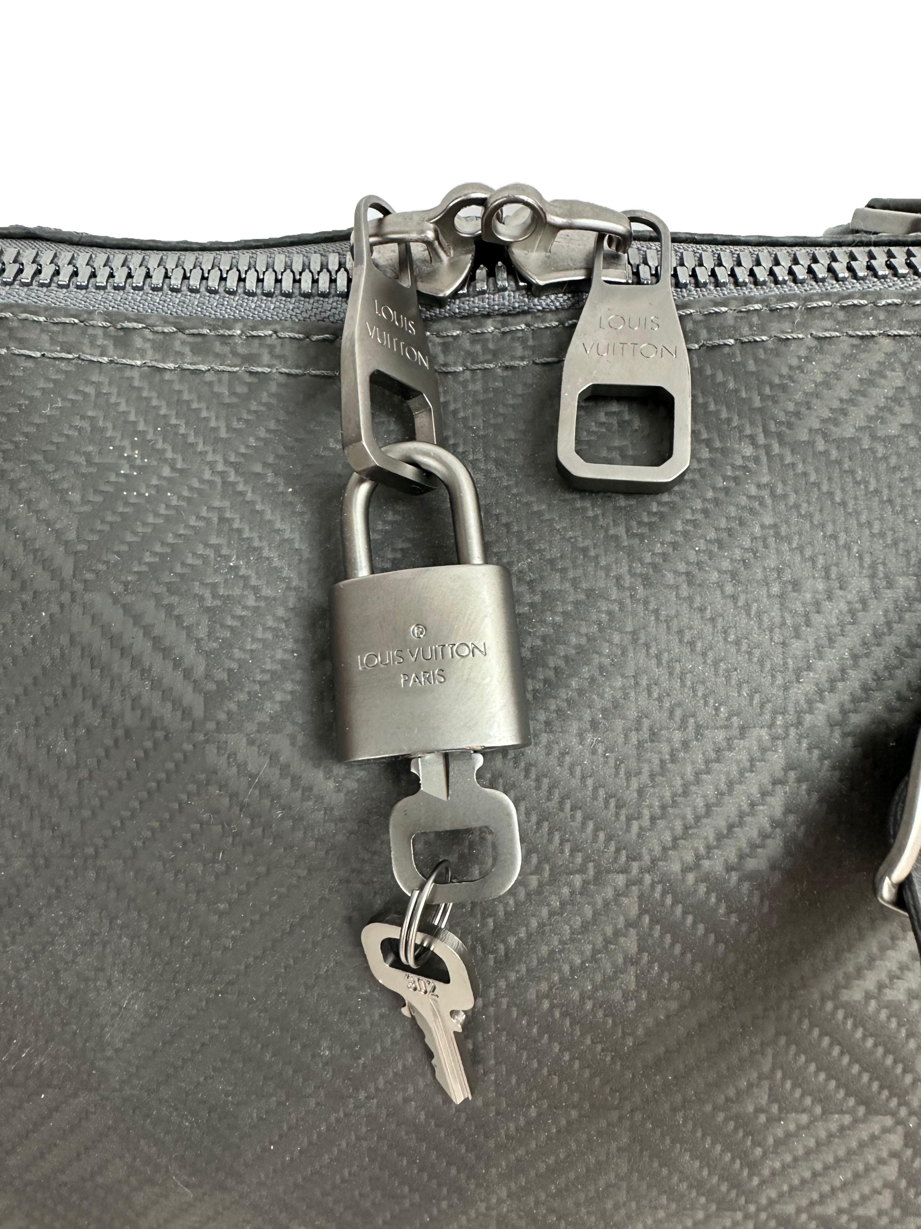 Louis Vuitton Keepall 45 in damier carbone with leather trim