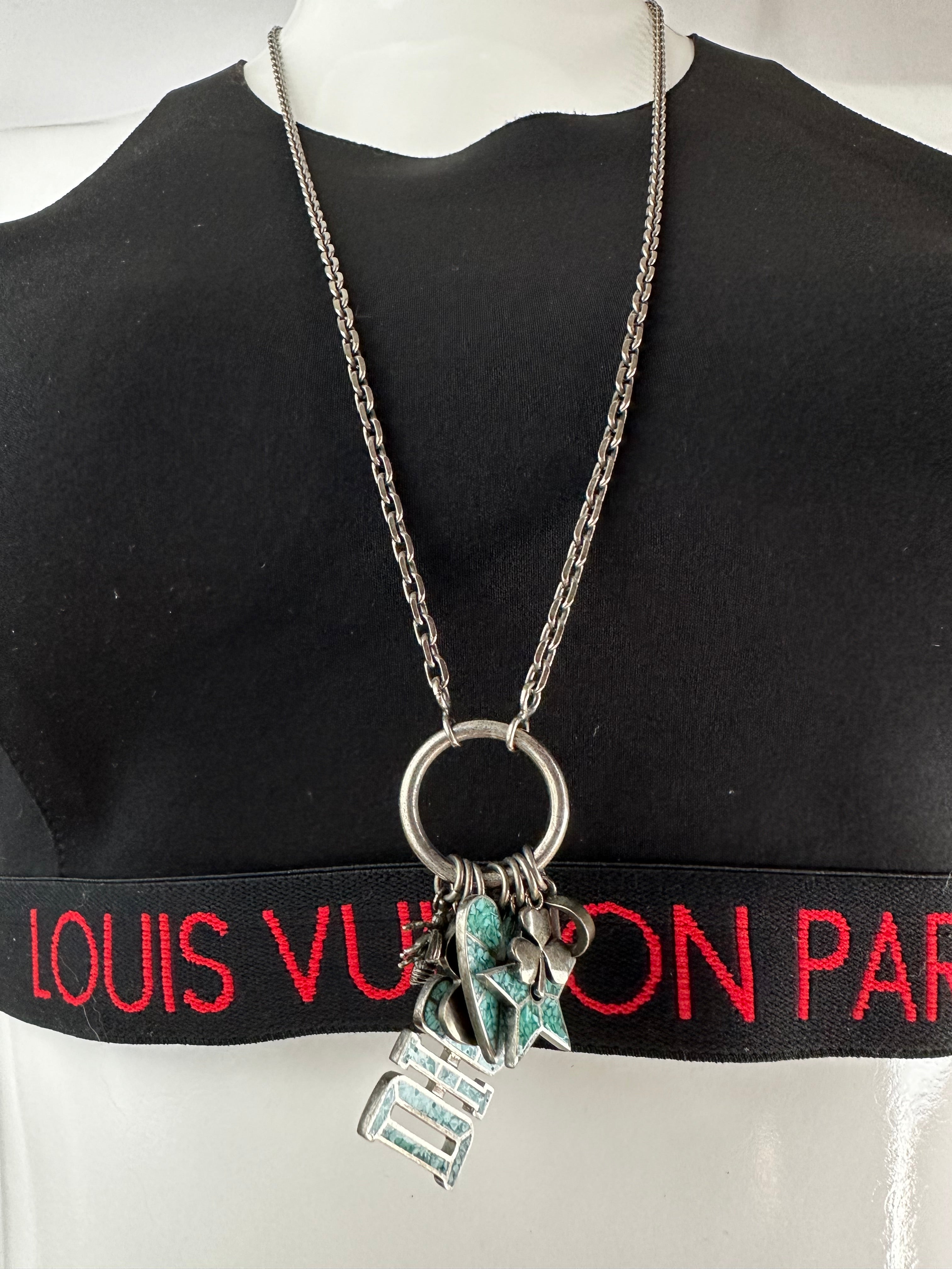 Dior metalic necklace with multi charms