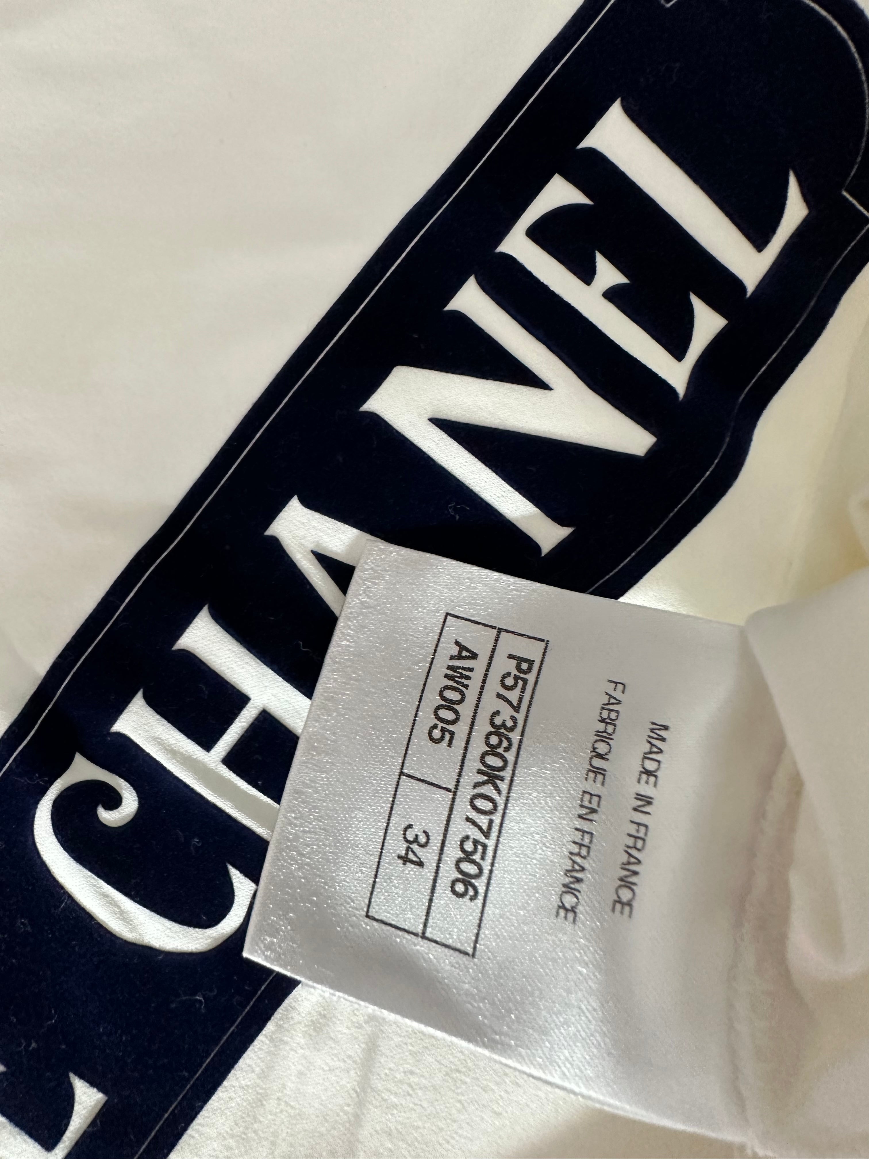 Chanel white top with "Gabrielle Chanel" lettering in navy blue - size 34