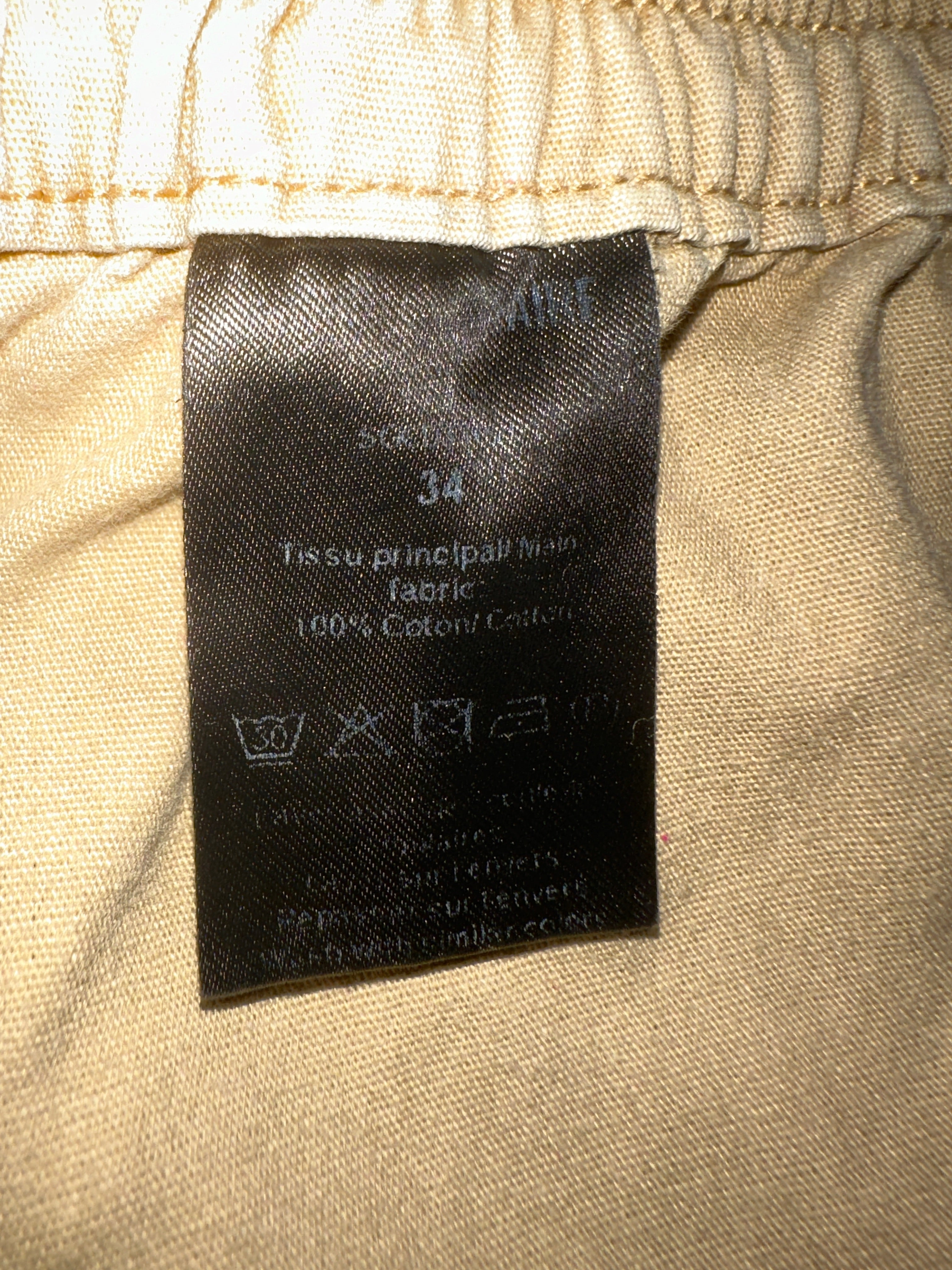 Zadig & Voltaire beige shorts with black and gold line on the side - size 34