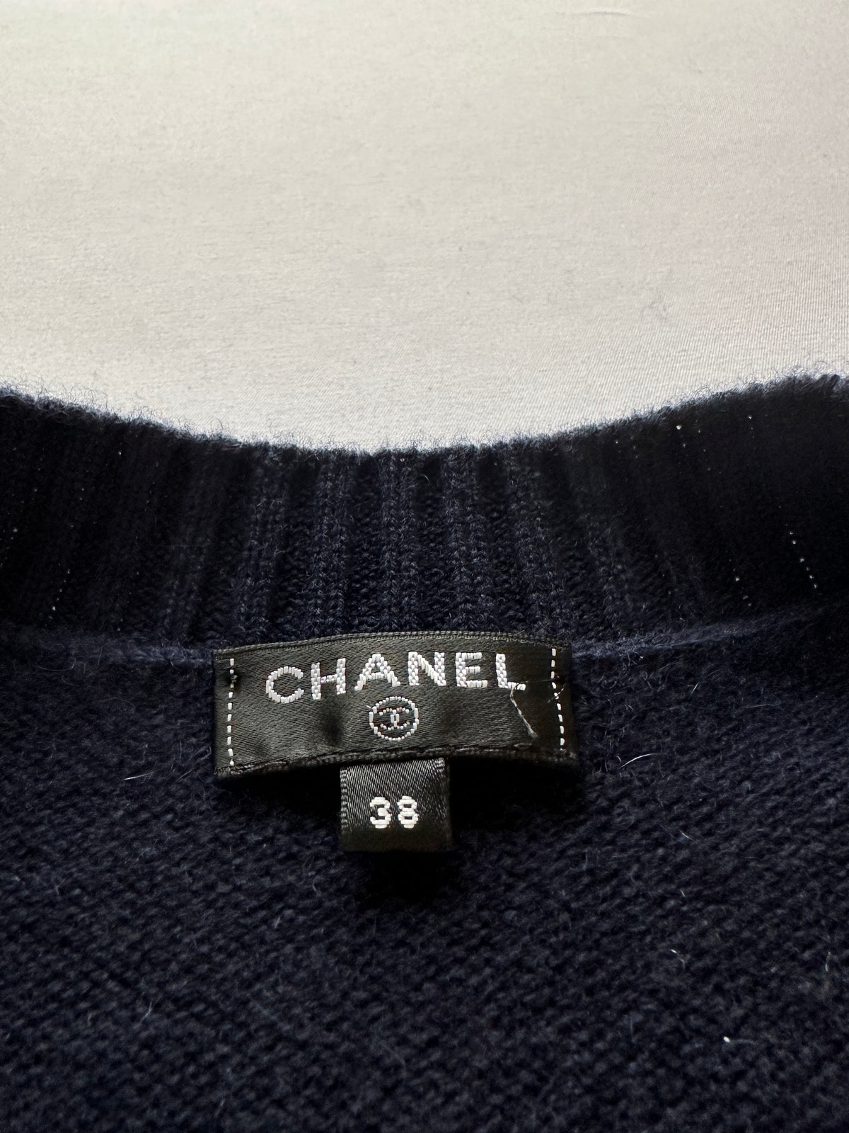 Chanel blue V-neck sweater with "Gabrielle coco" multicolor inscription - size 38