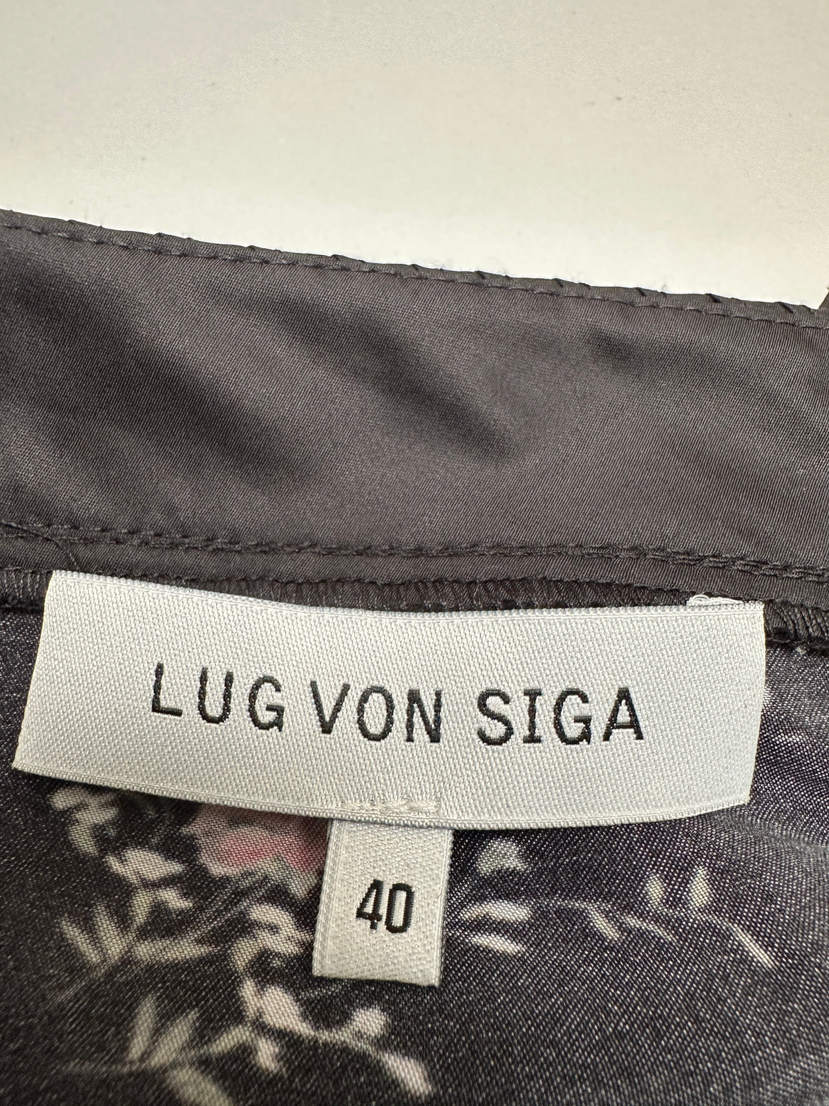 Lug Von Siga black ruffled top with floral motif - size 40