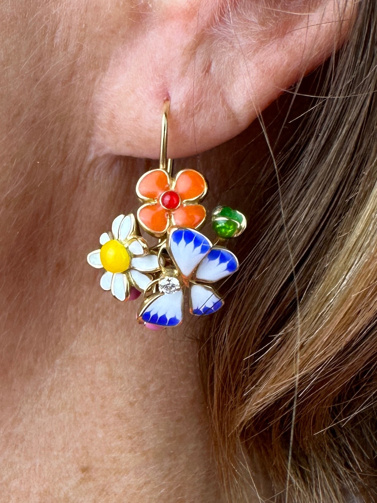 Gold earrings collection Diorette and Milli Carnivora