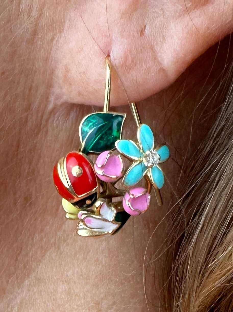 Gold earrings collection Diorette and Milli Carnivora