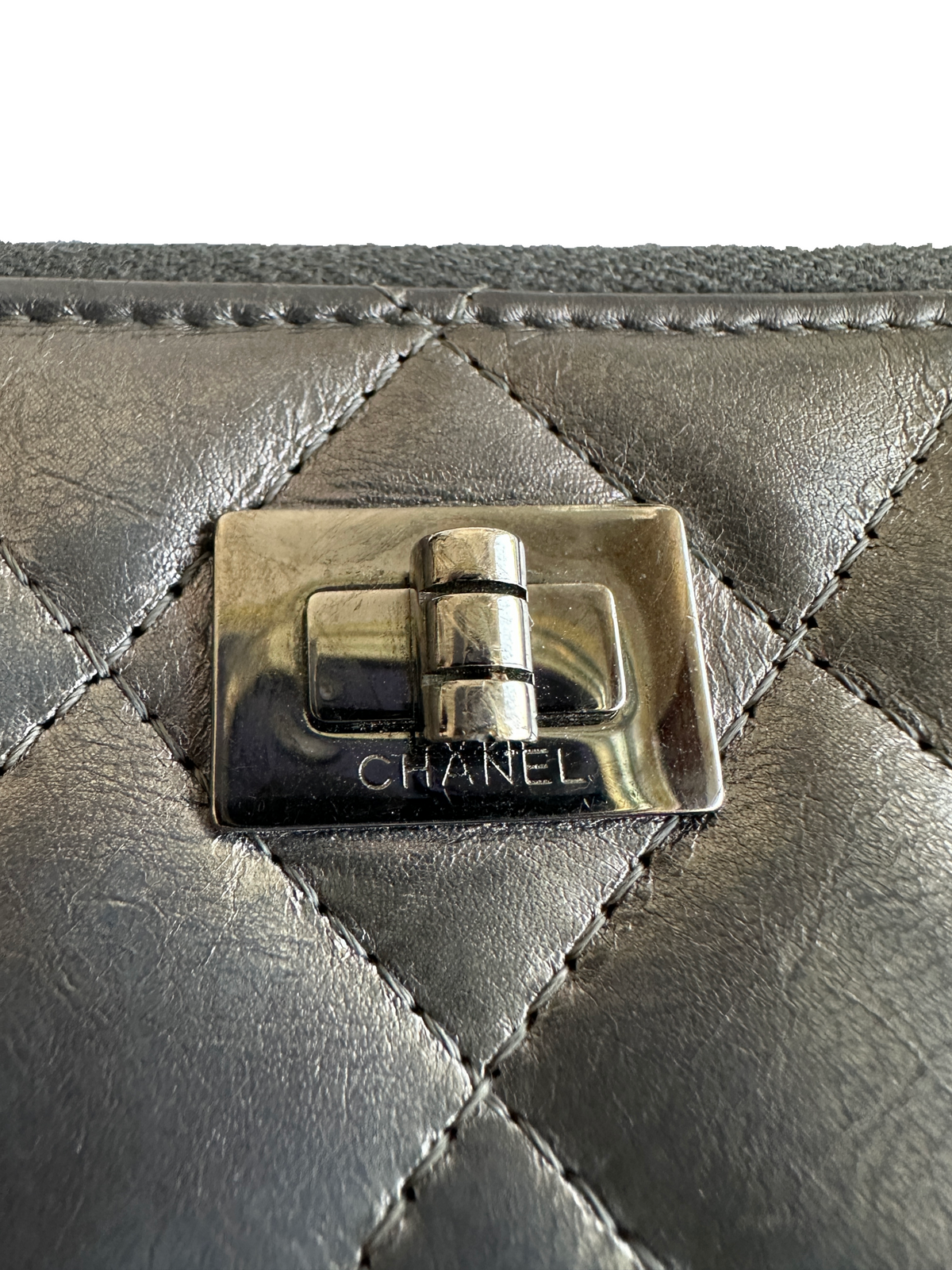 Chanel 2.55 zipped wallet in quilted metallic leather