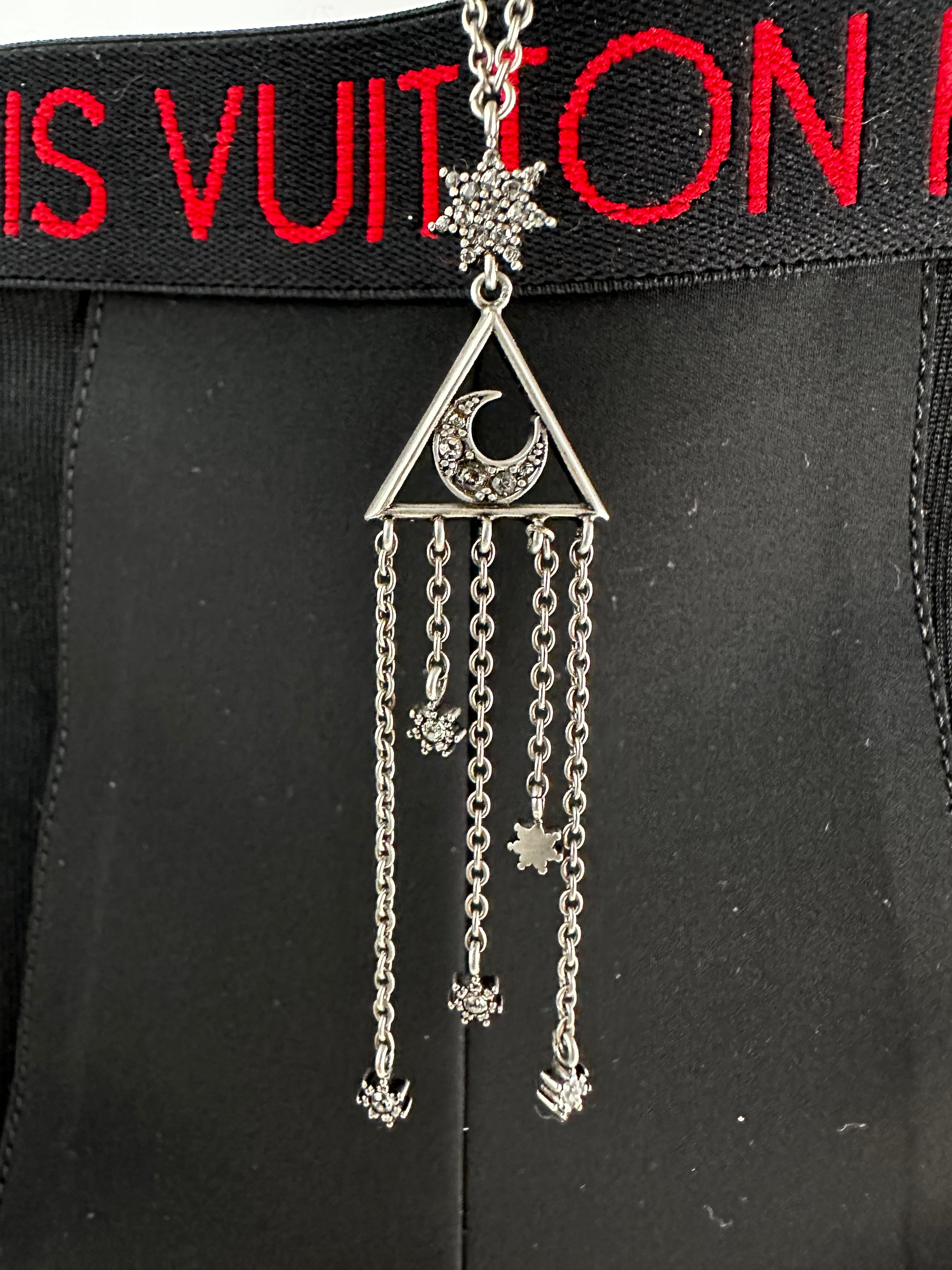 Dior silver necklace with moon and star