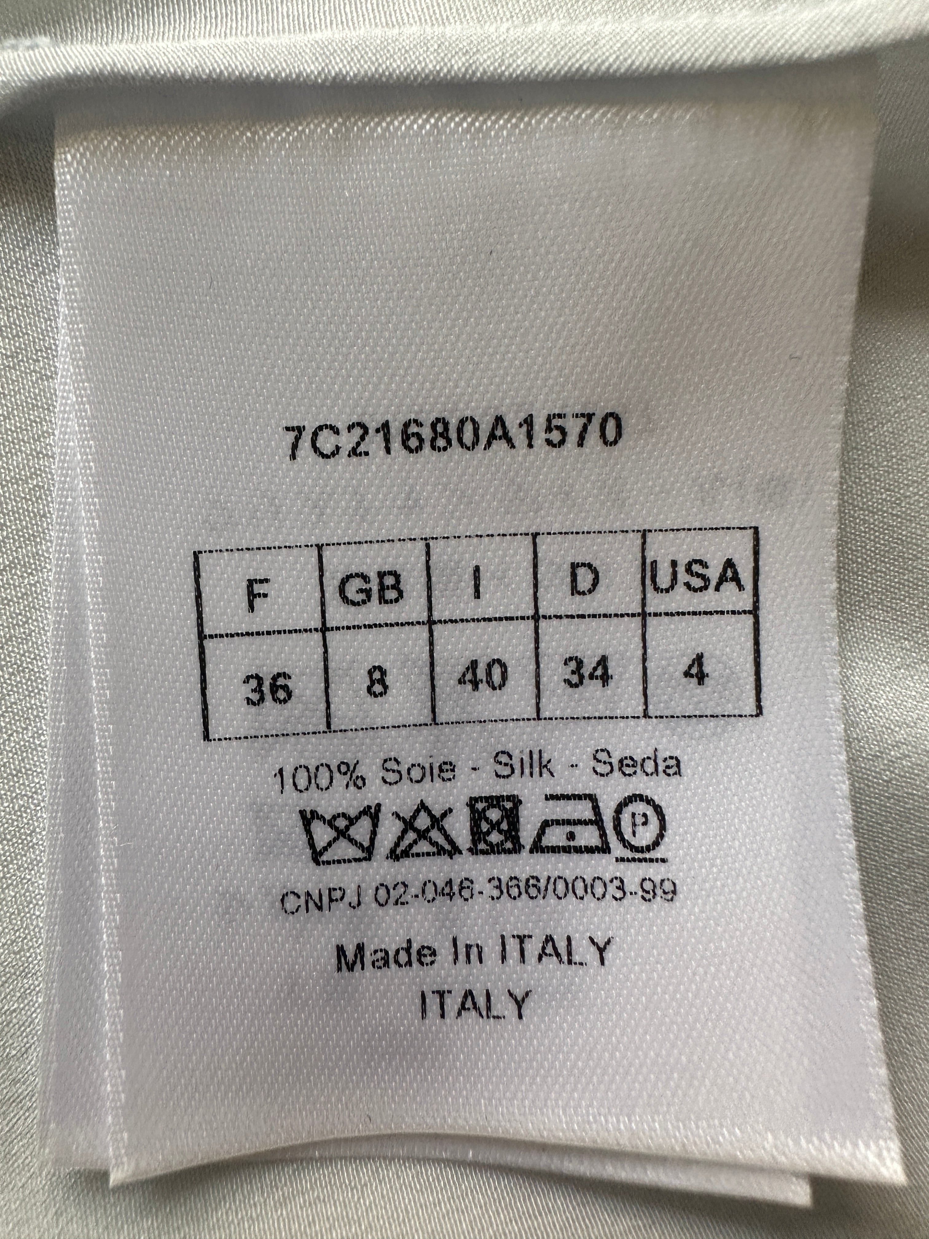 Dior blue sleeveless V-neck dress with black and green motifs - size 36