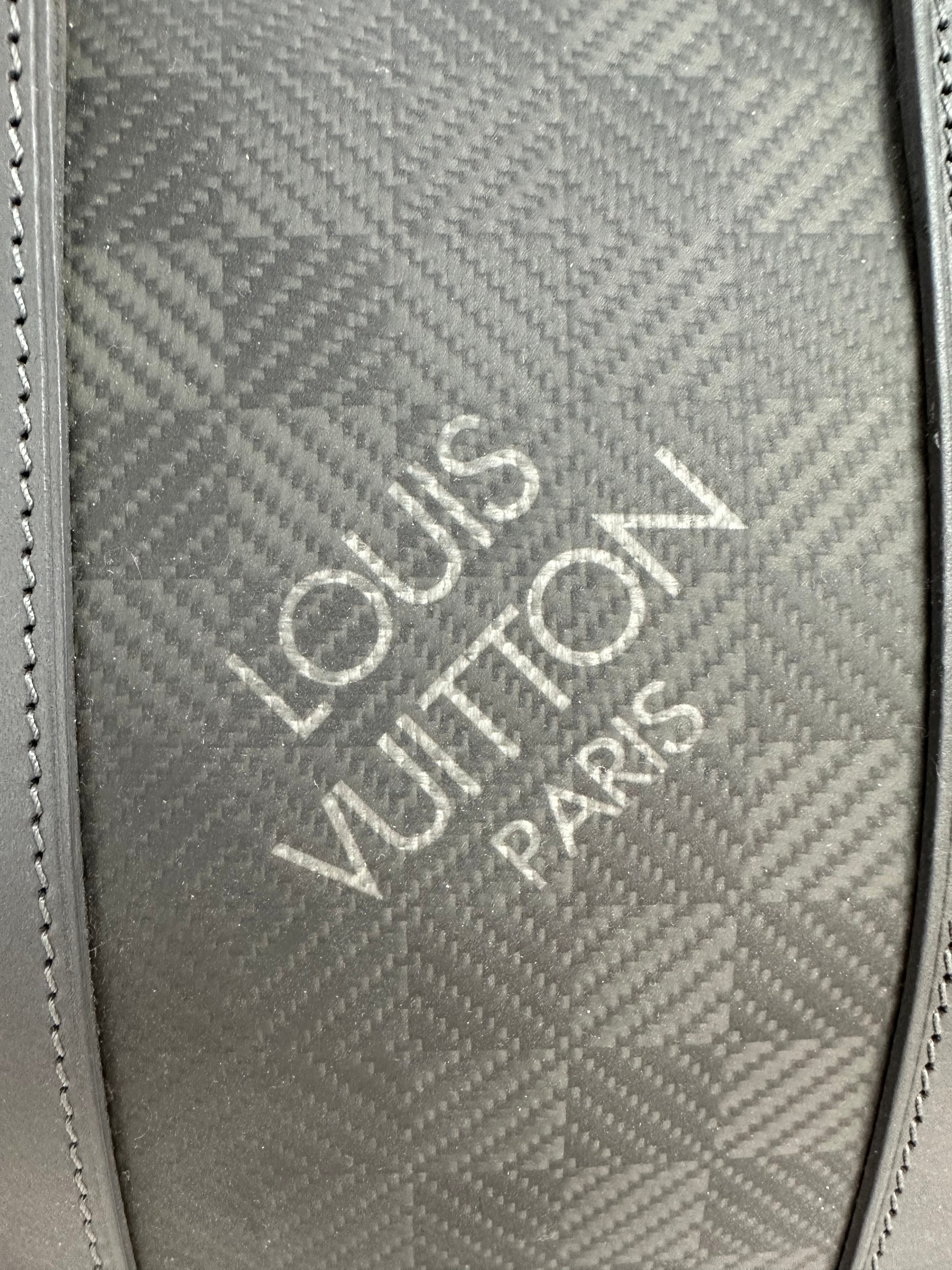 Louis Vuitton Keepall 45 in damier carbone with leather trim