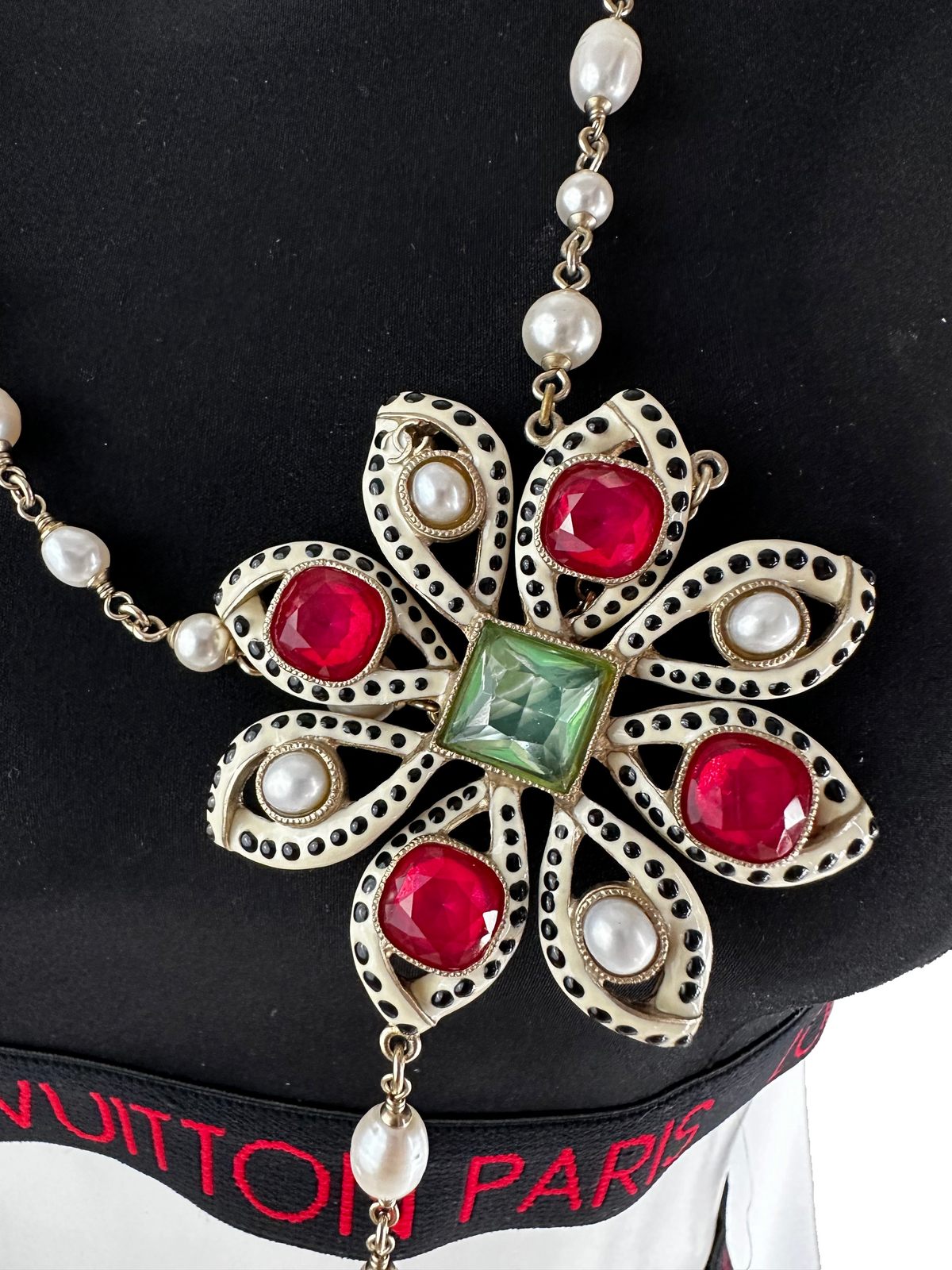 Chanel sautoire with red flower necklace