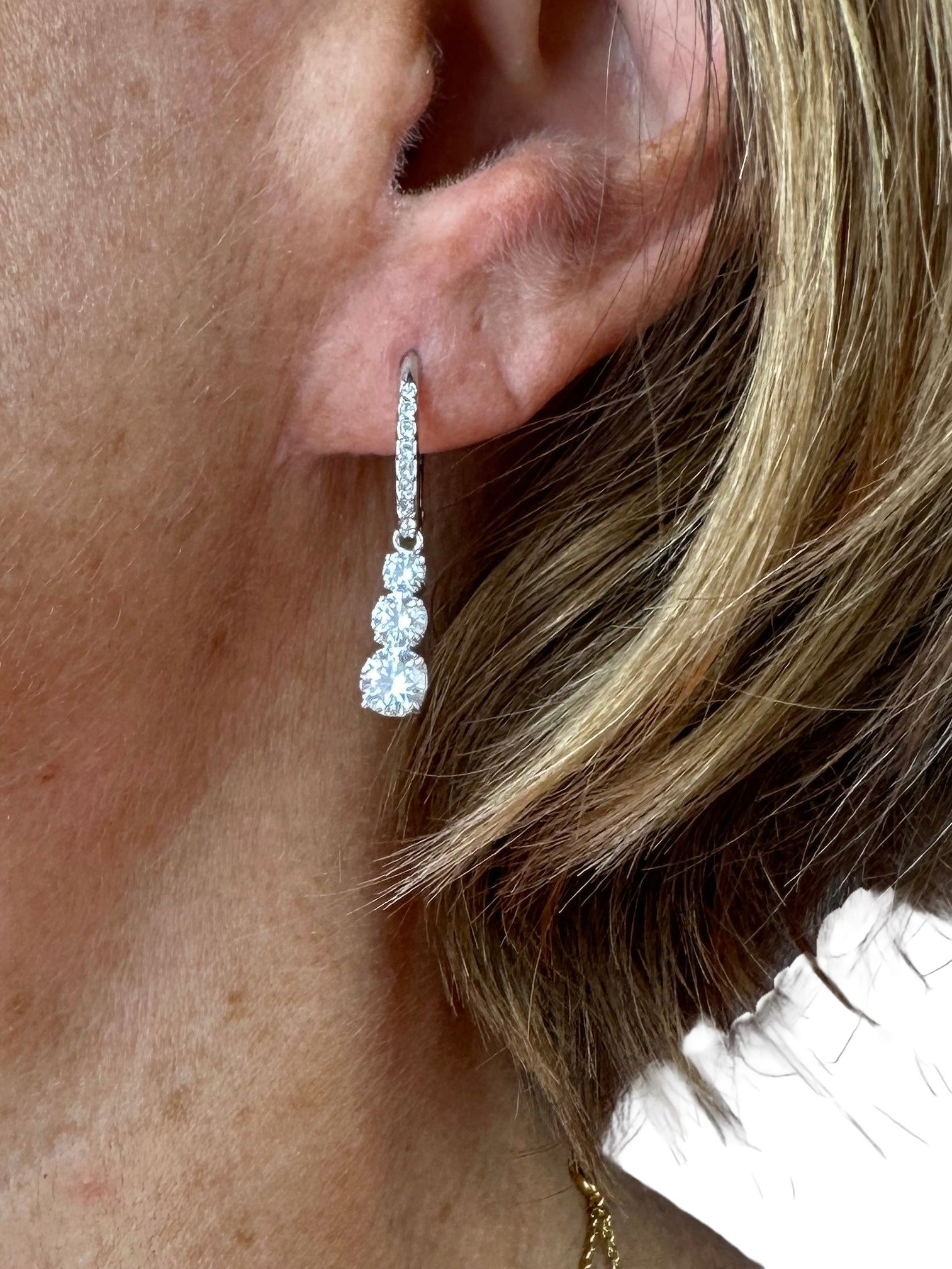 Swarovski attract trilogy round pierced earrings in rhodium-plated metal