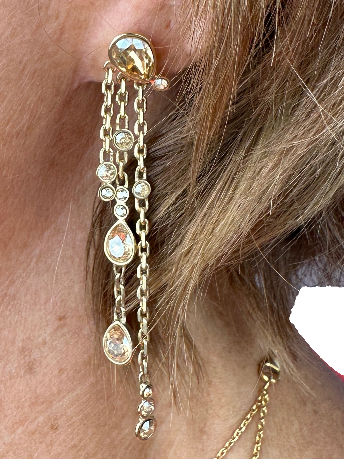 Dior gold drop earrings with drop-shaped stones