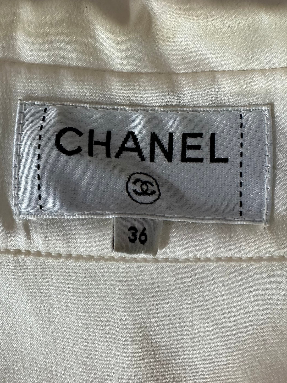 Chanel sleeveless silk blouse white with black tie - size 36 FR